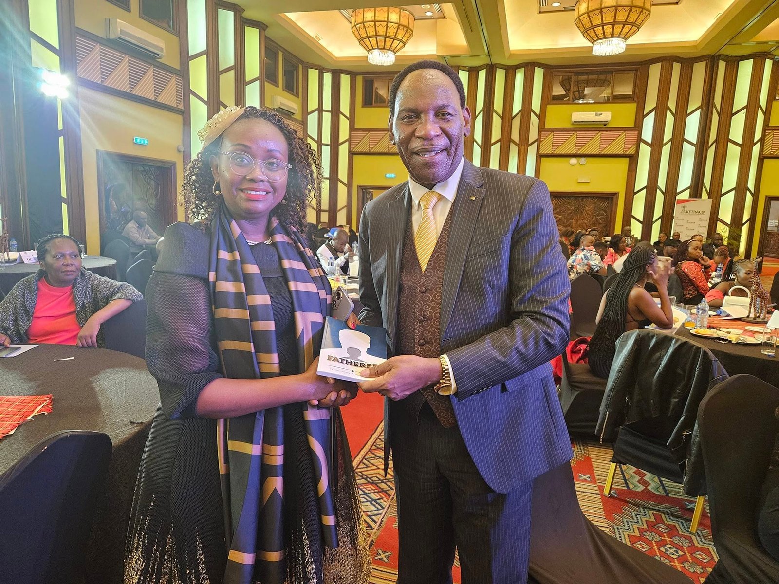 With Ezekiel Mutua